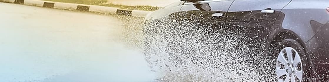 Car in logging water