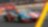 Ferrari 488 GTE numéro 51 aux couleurs de l'équipe AF Corse sur le circuit des 24 Heures du Mans, avec publicités Shell et Nissan en arrière-plan